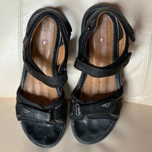 Clark’s Velcro adjustable sandals.